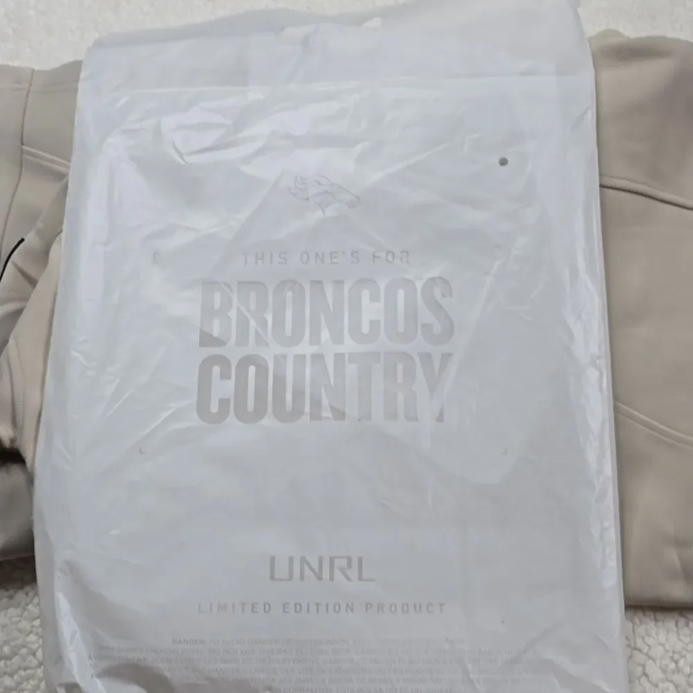 793 NWT UNRL x Broncos Impact Full-Zip SIZE SMALL Color SAND